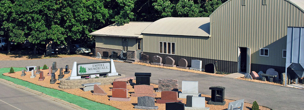 First slide - Ariel photo of Empire Memorials' manufacturing facility and outside monument display